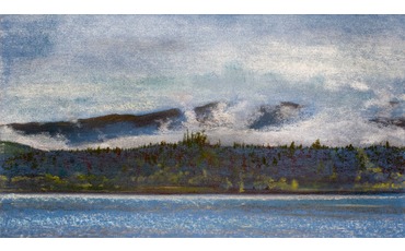 Горы в облаках на озере Блед